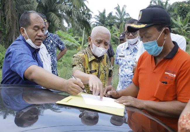 Bupati Asahan Tinjau Rencana Normalisasi Saluran Air Binjai Serbangan
